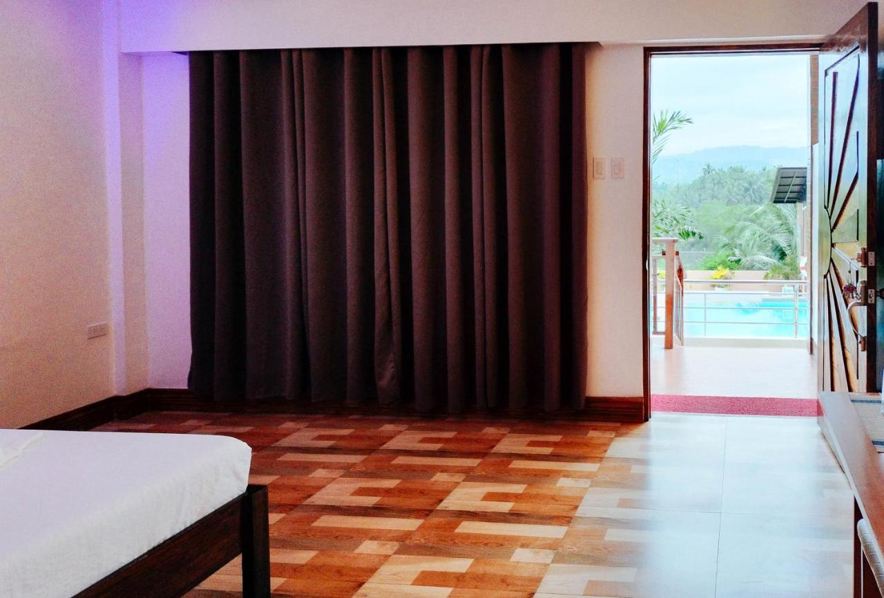 Reddoorz @ Sun Kissed Resort Guindulman อันดา ภายนอก รูปภาพ